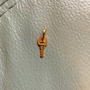 Solid 14k yellow gold tiny cross pendant